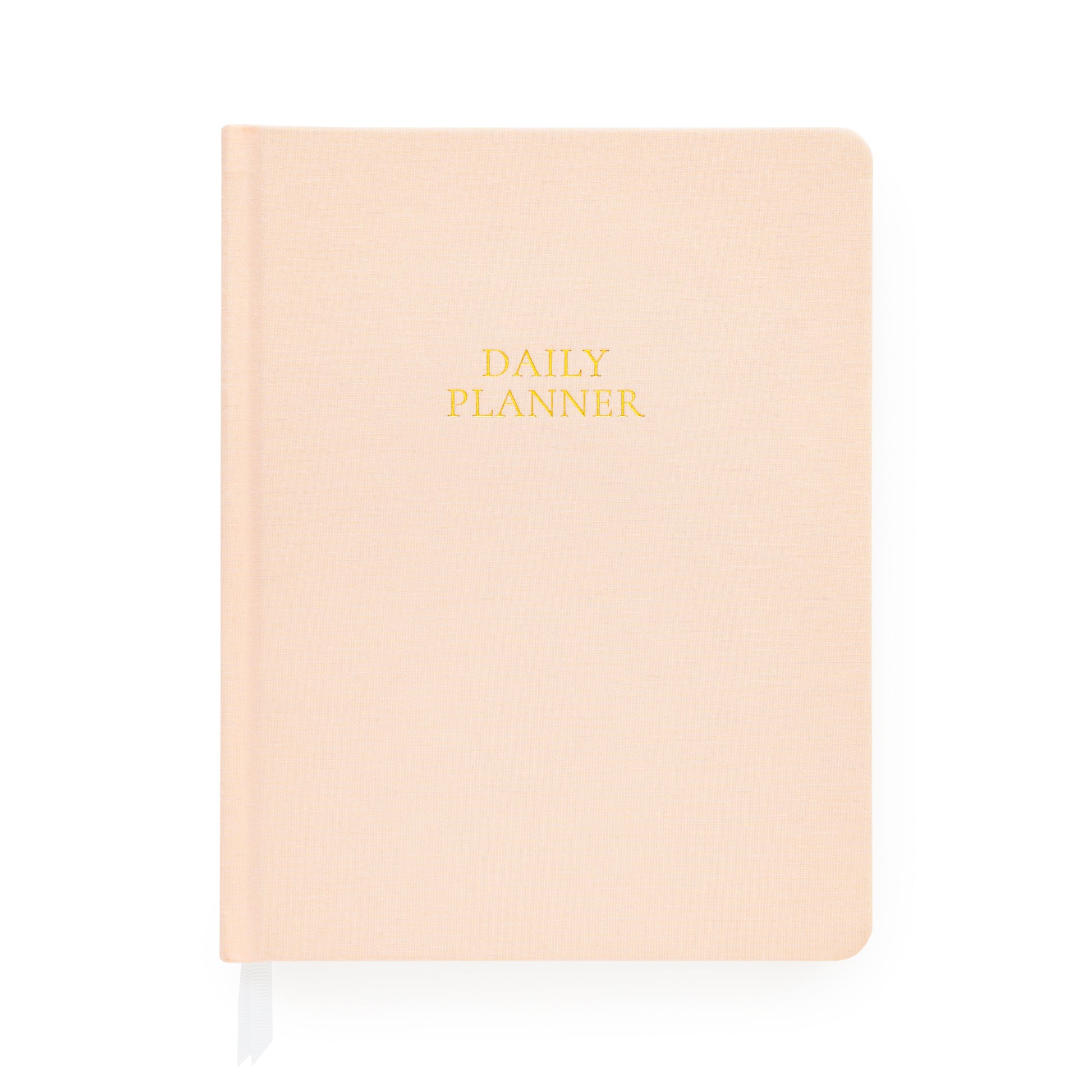 Pale pink fabric daily planner foil stamped with daily planner in gold on cover