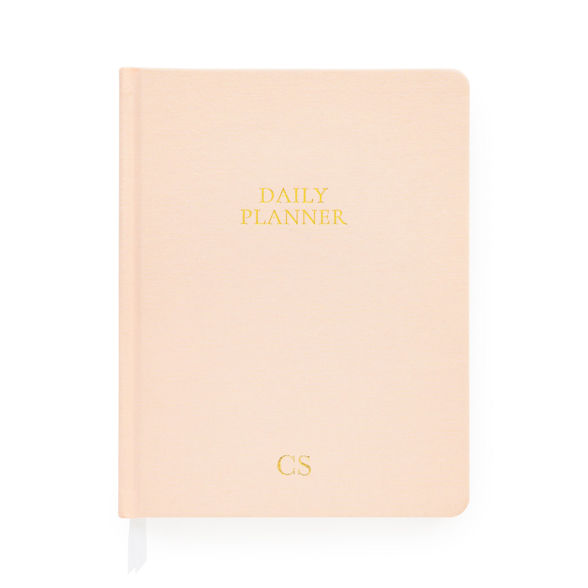 Pale pink daily planner with gold monogram initials