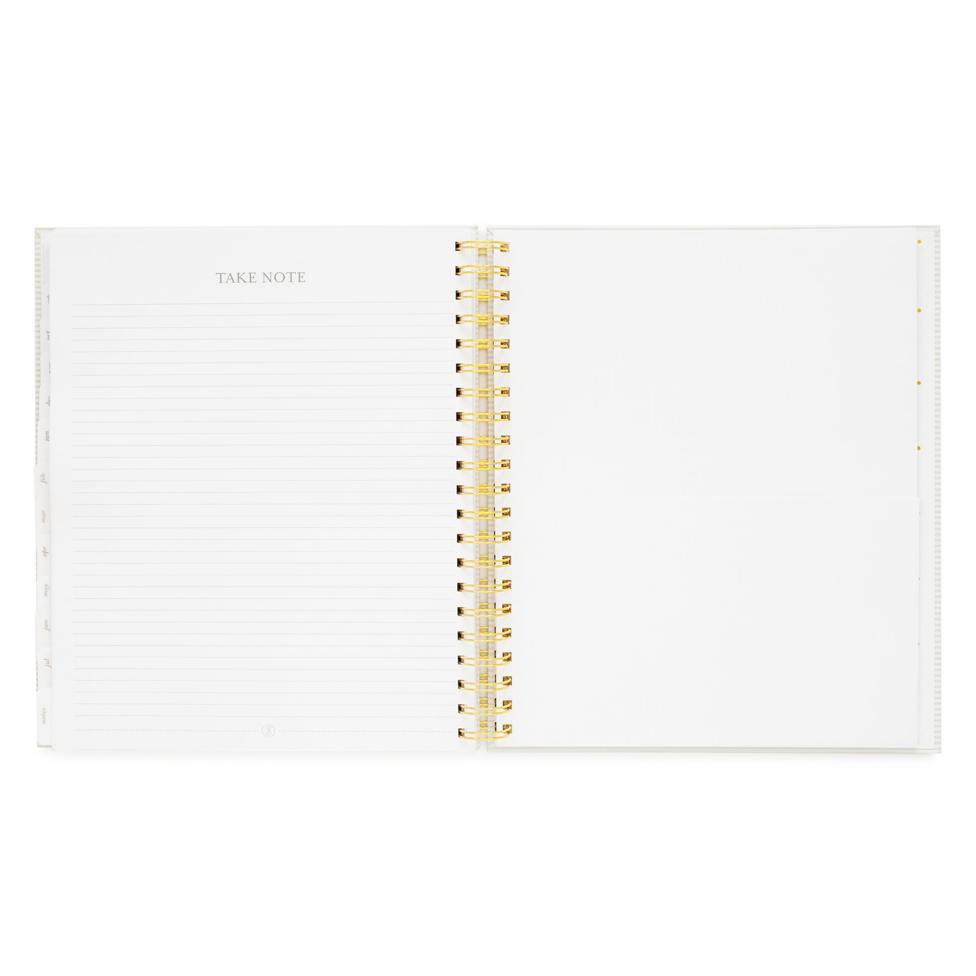 spiral planner open to notes page and folder pocket