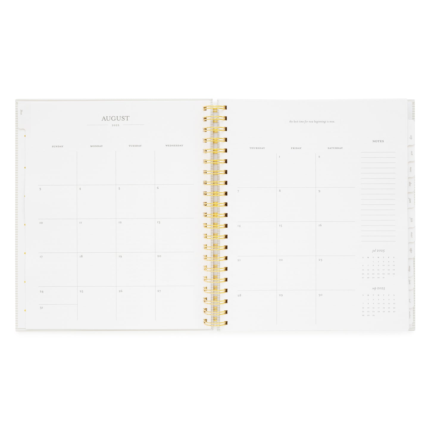 spiral planner open to august monthly grid pages
