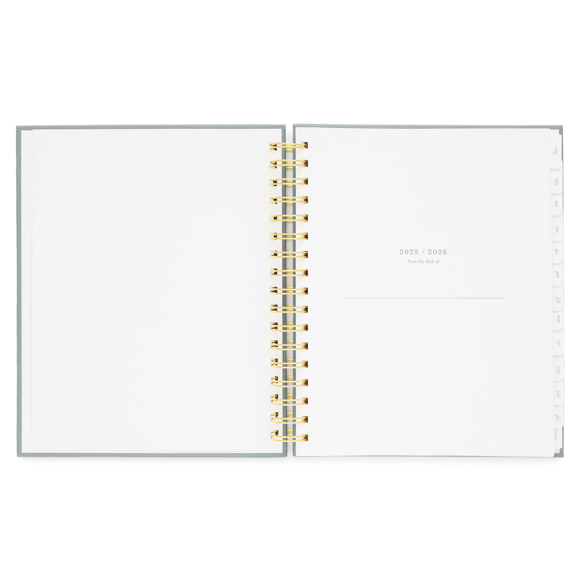 spiral planner open to 2025/2026 from the desk of page