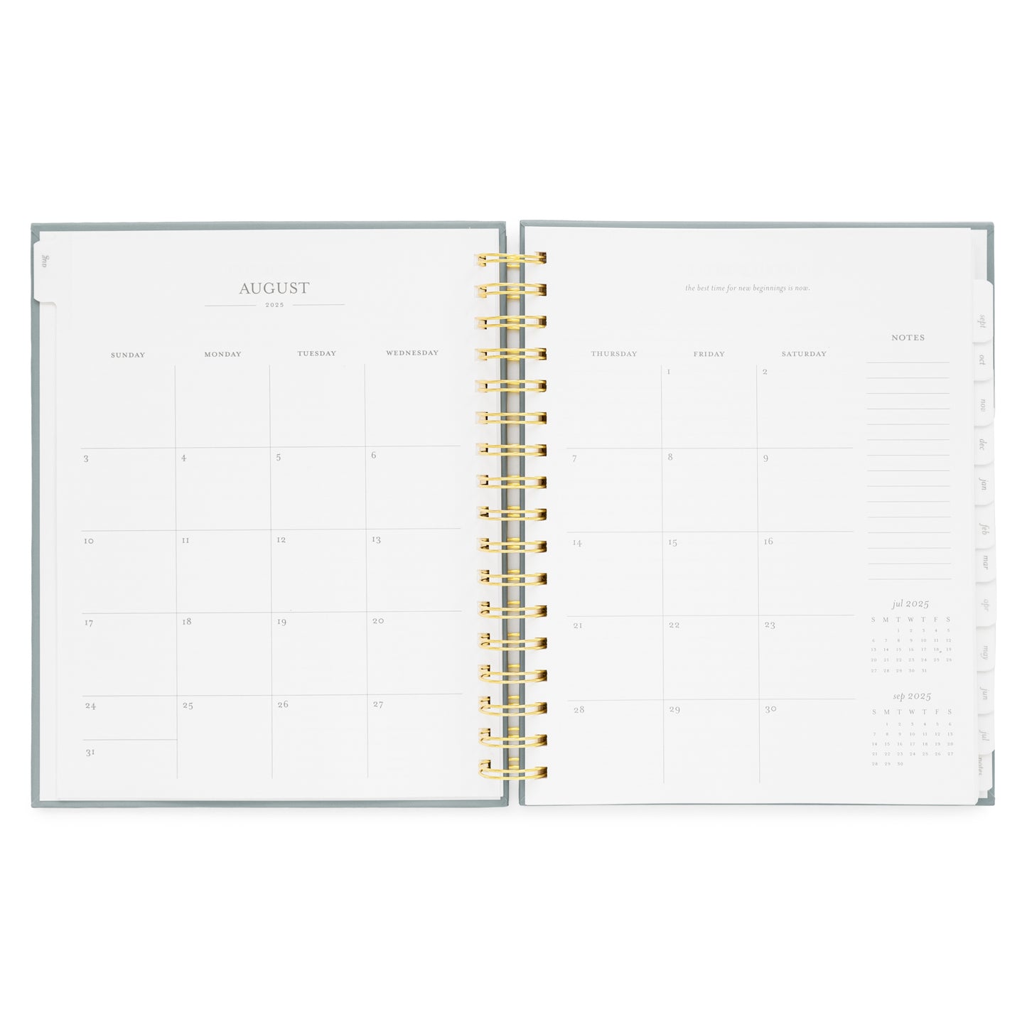 spiral planner open to august monthly grid pages