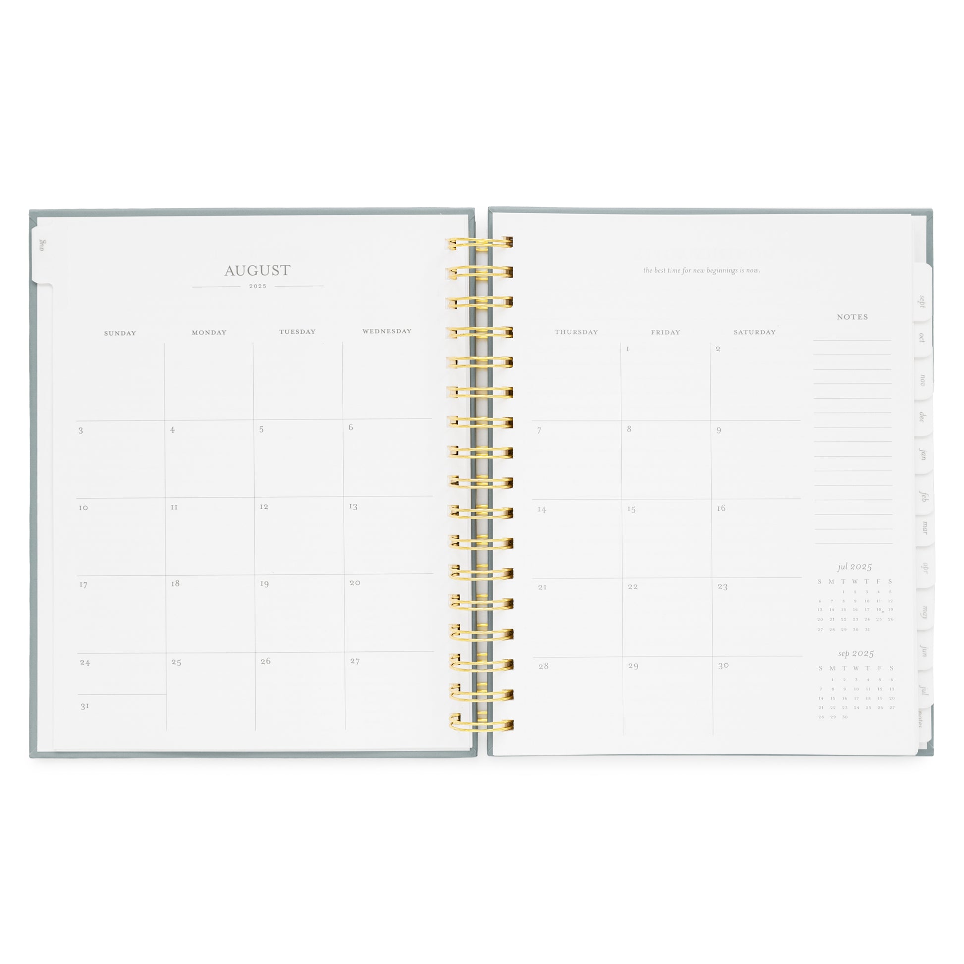 spiral planner open to august monthly grid pages