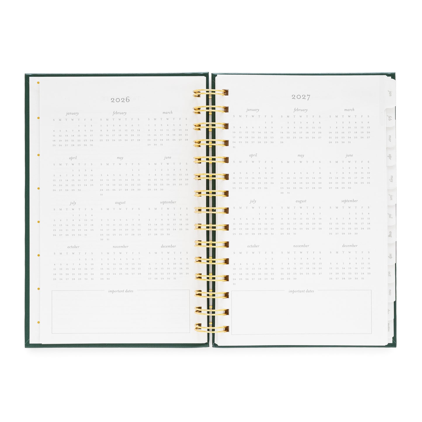 Open small spiral planner showing pages for 2026 and 2027 months