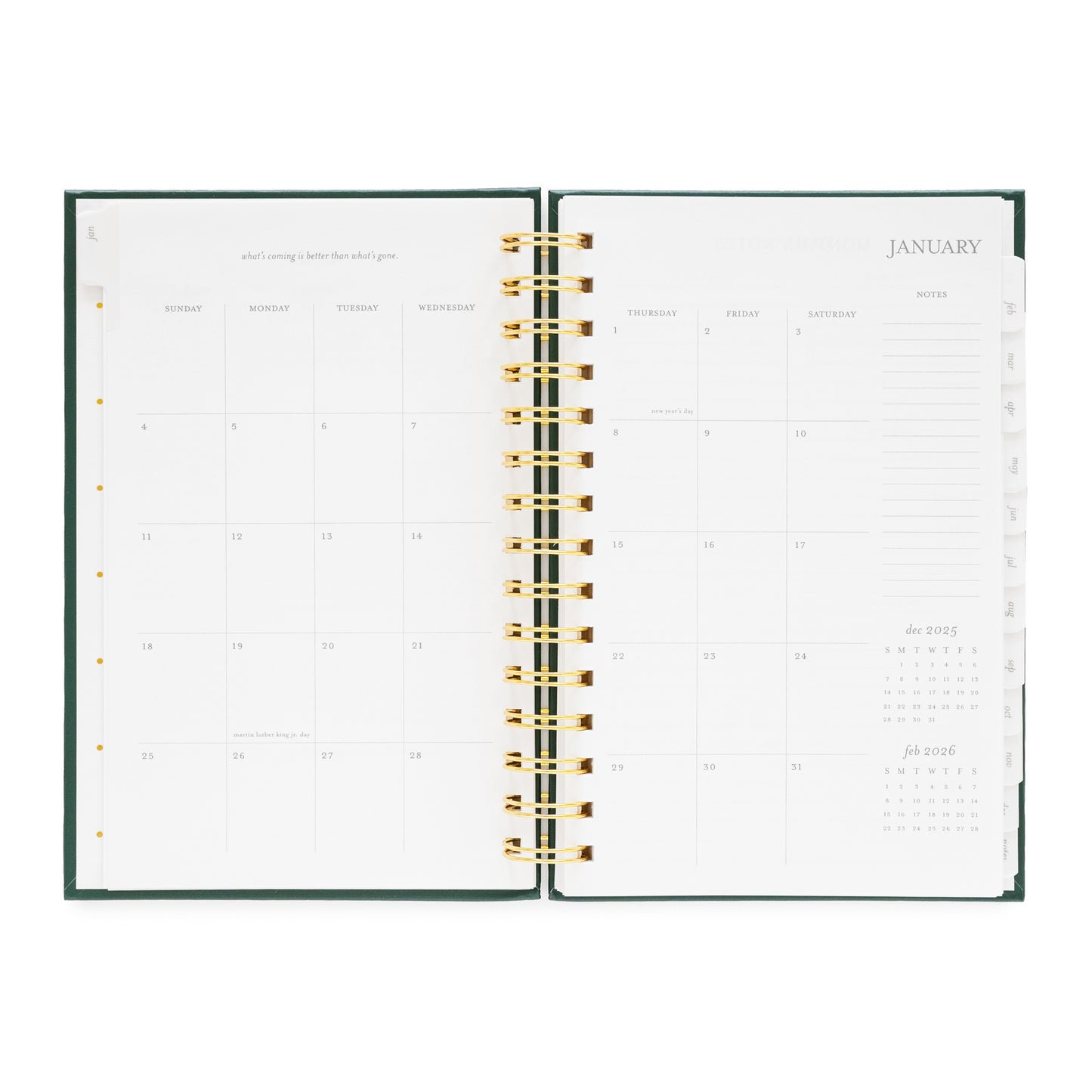 Open small spiral planner showing a monthly calendar layout for January 2026