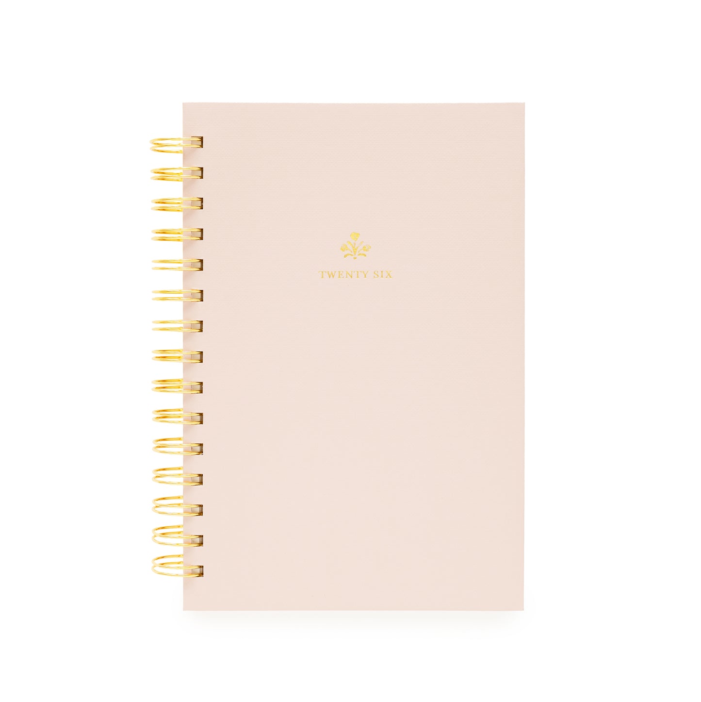Blush pink planner with gold spiral binding with twenty-six on the cover and a god flower