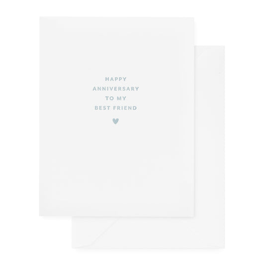 white anniversary card with slate blue text and white envelope