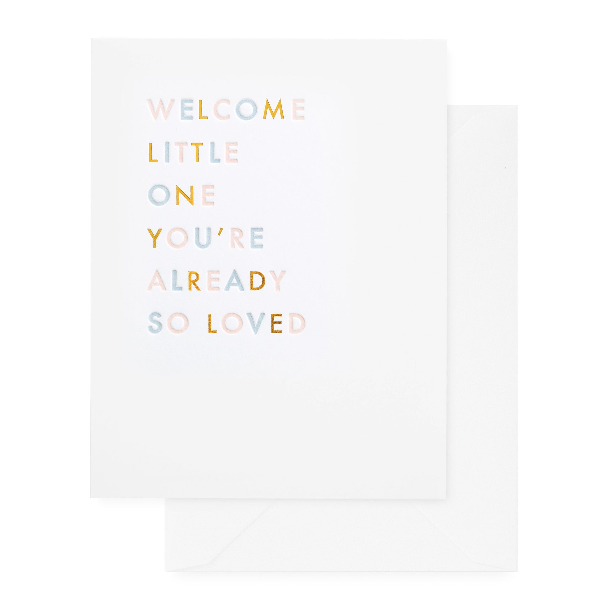 A greeting card with the text 'WELCOME LITTLE ONE YOU'RE ALREADY SO LOVED' printed on it in pink, blue and gold foil paired with a white envelope
