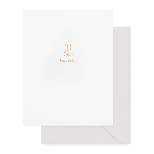 white hello baby card with gold text and bunny icon, antique grey envelope