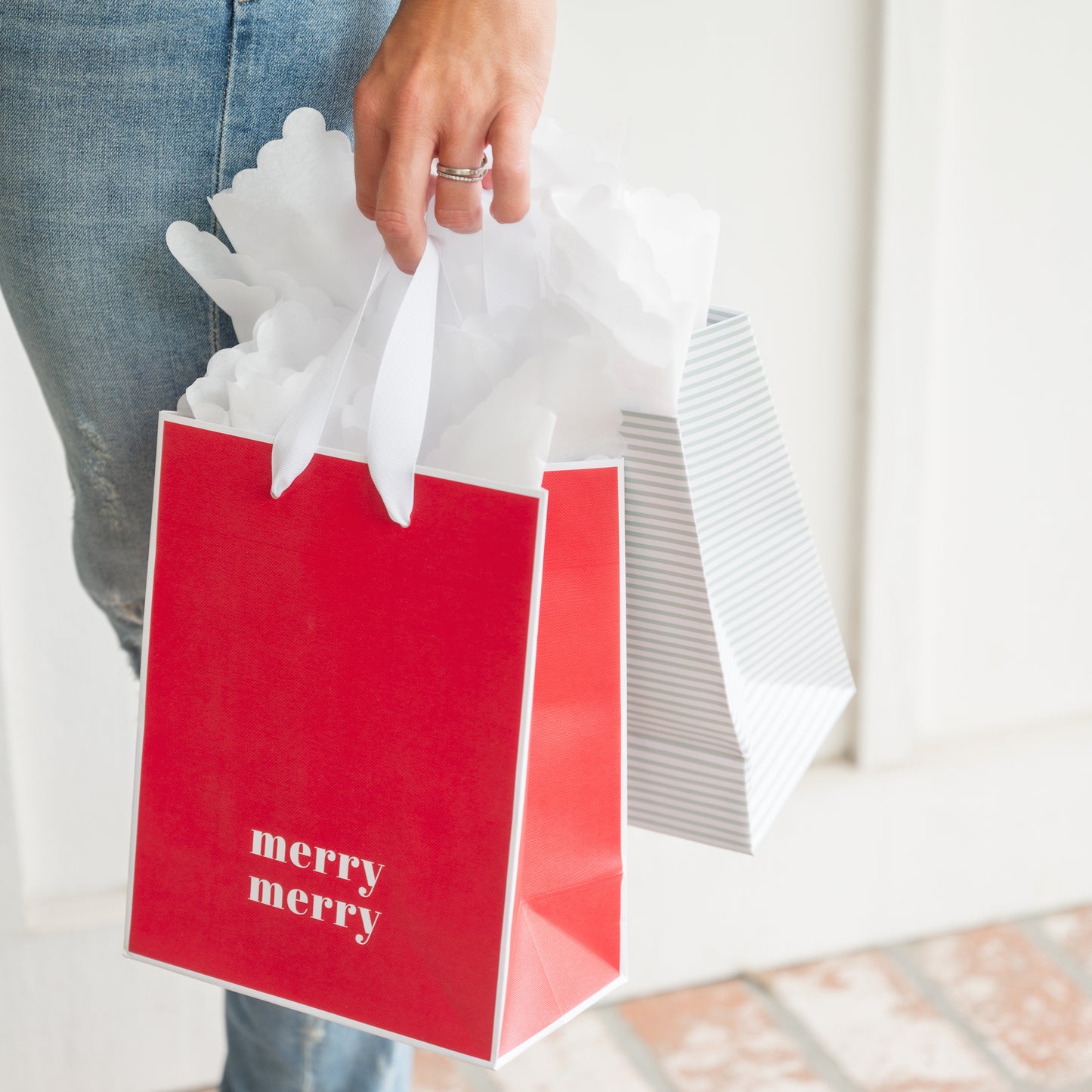 Red Merry Merry Gift Bag in Hand