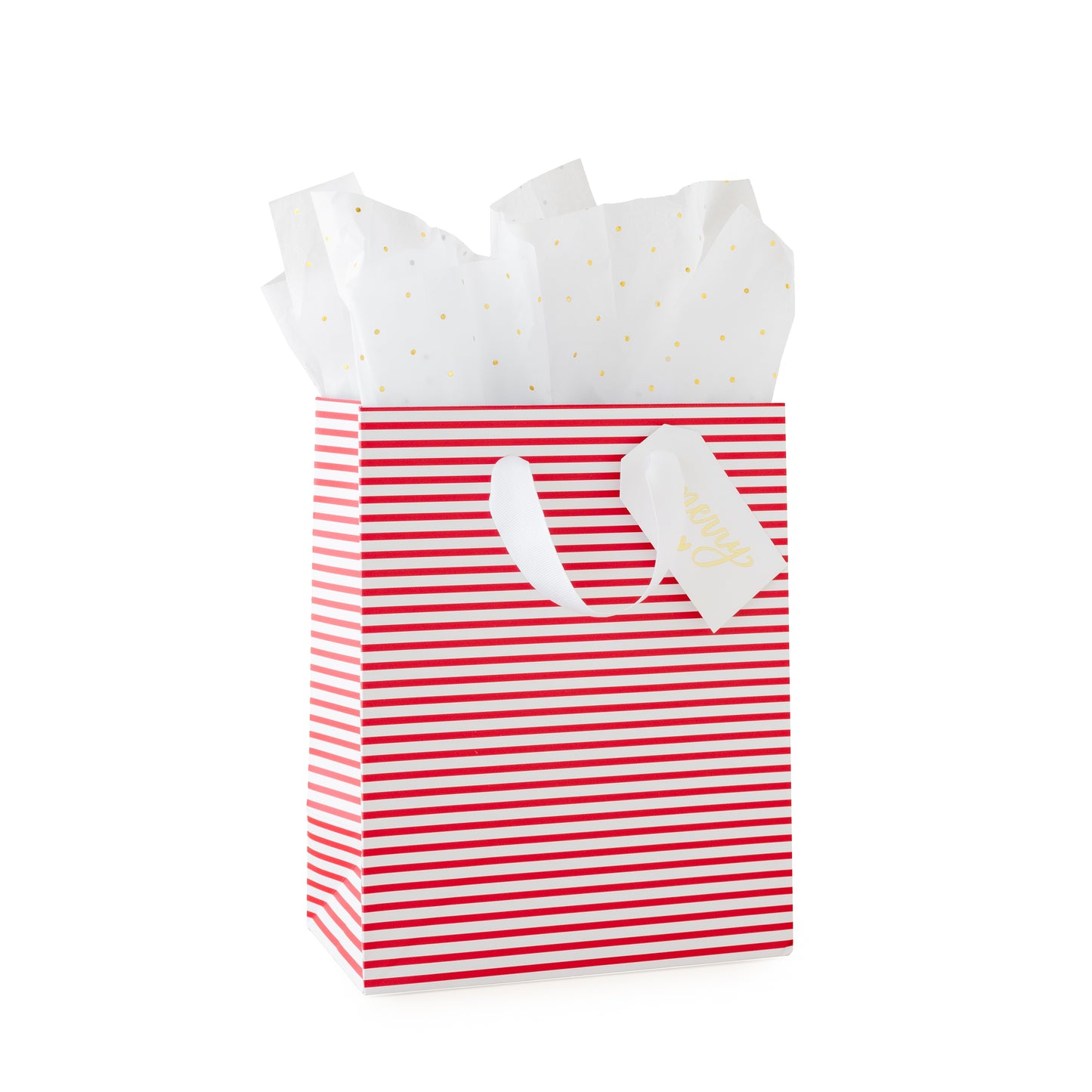 Red and white striped gift bag with a white gift tag with 'merry' and a heart printed in gold foil with gold dot tissue paper