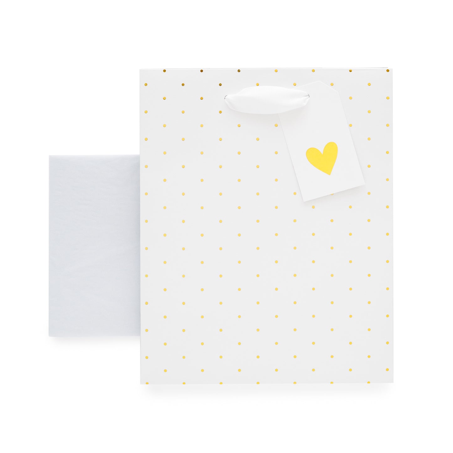 White gift bag with gold foil dot pattern, gold foil heart gift tag and sheets of white tissue paper
