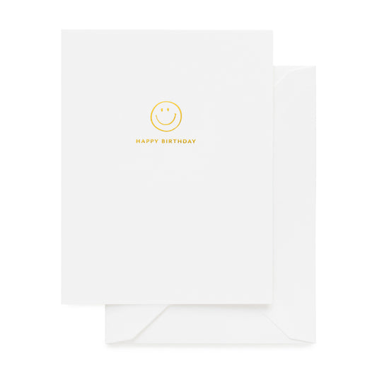 Gold foil happy birthday card with a smiley face