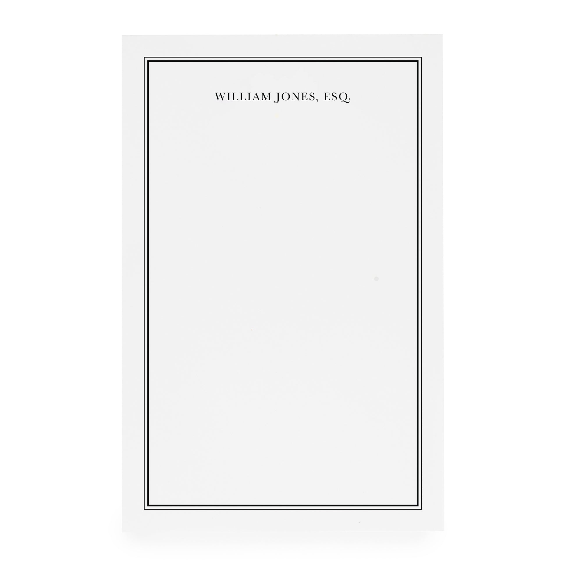 White custom notepad with black border and 'william jones, esq' printed