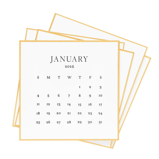 Stack of calendar cards for January 2026 with a gold border and black ink