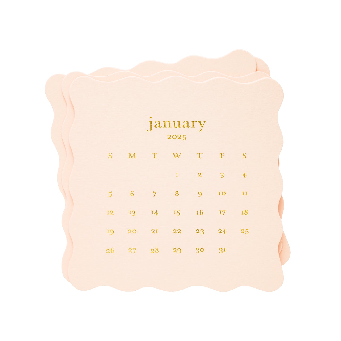 stack of pink scallop die cut desk calendar month cards