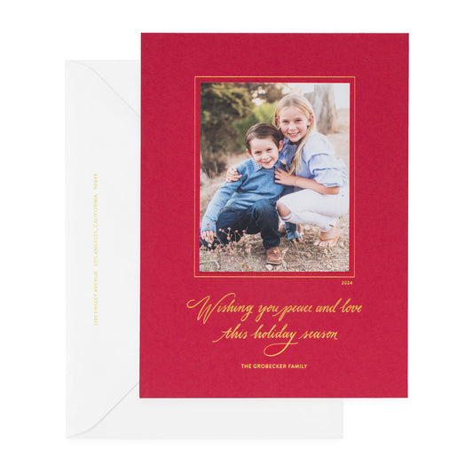 red custom holiday card with gold foil details and photo