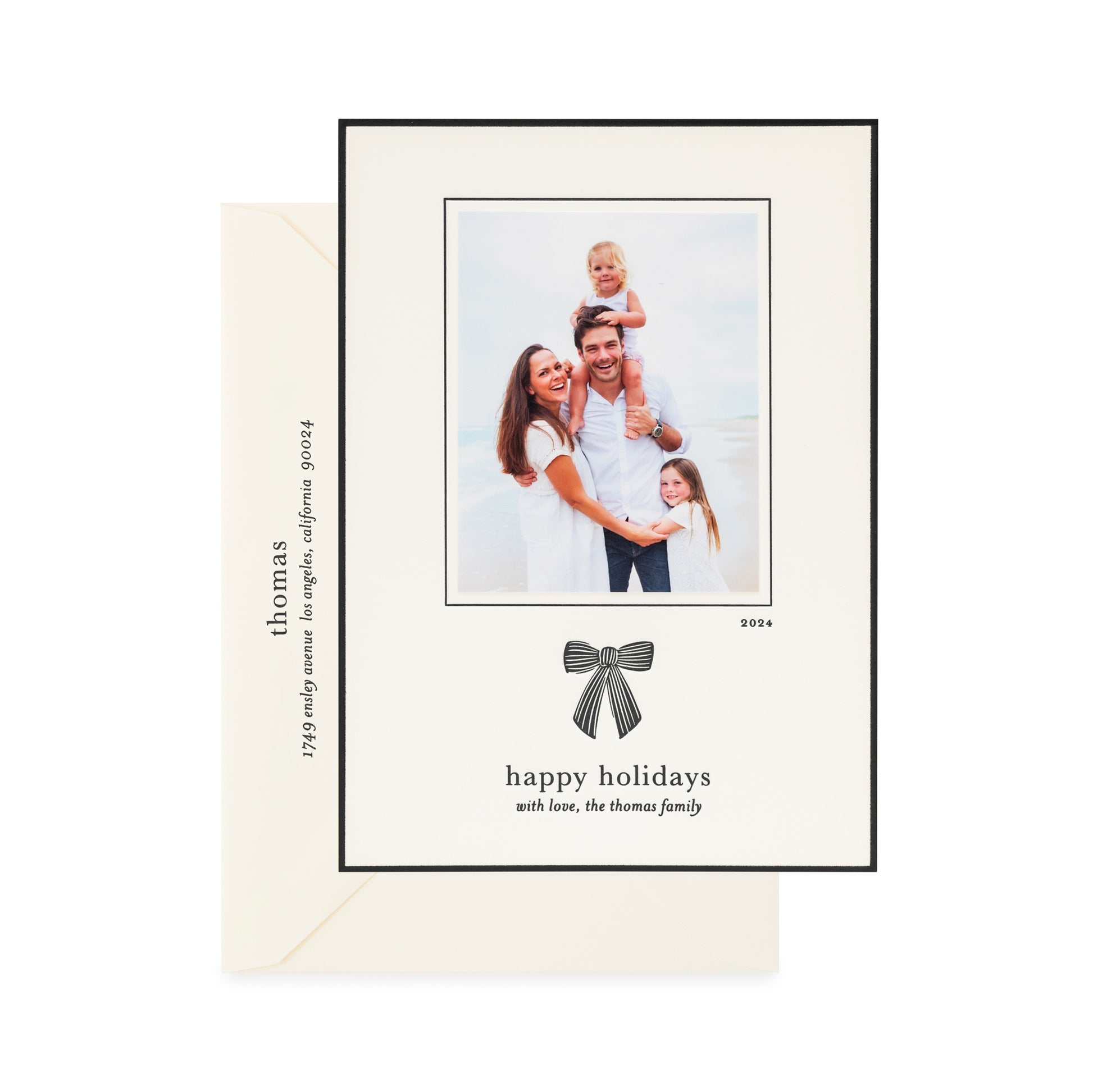cream and black custom holiday card with bow detail and photo