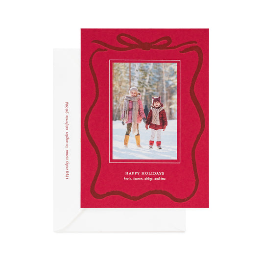 red holiday card with letterpress bow detail and photo