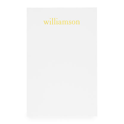 White custom notepad with gold foil name