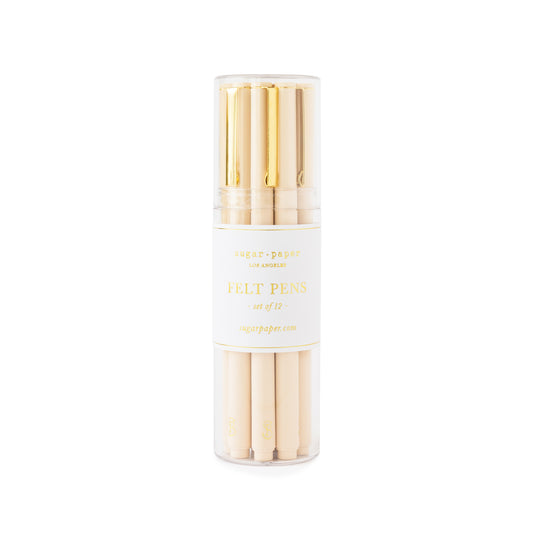 Set of 12 pale pink felt pens with gold details in a clear acrylic case