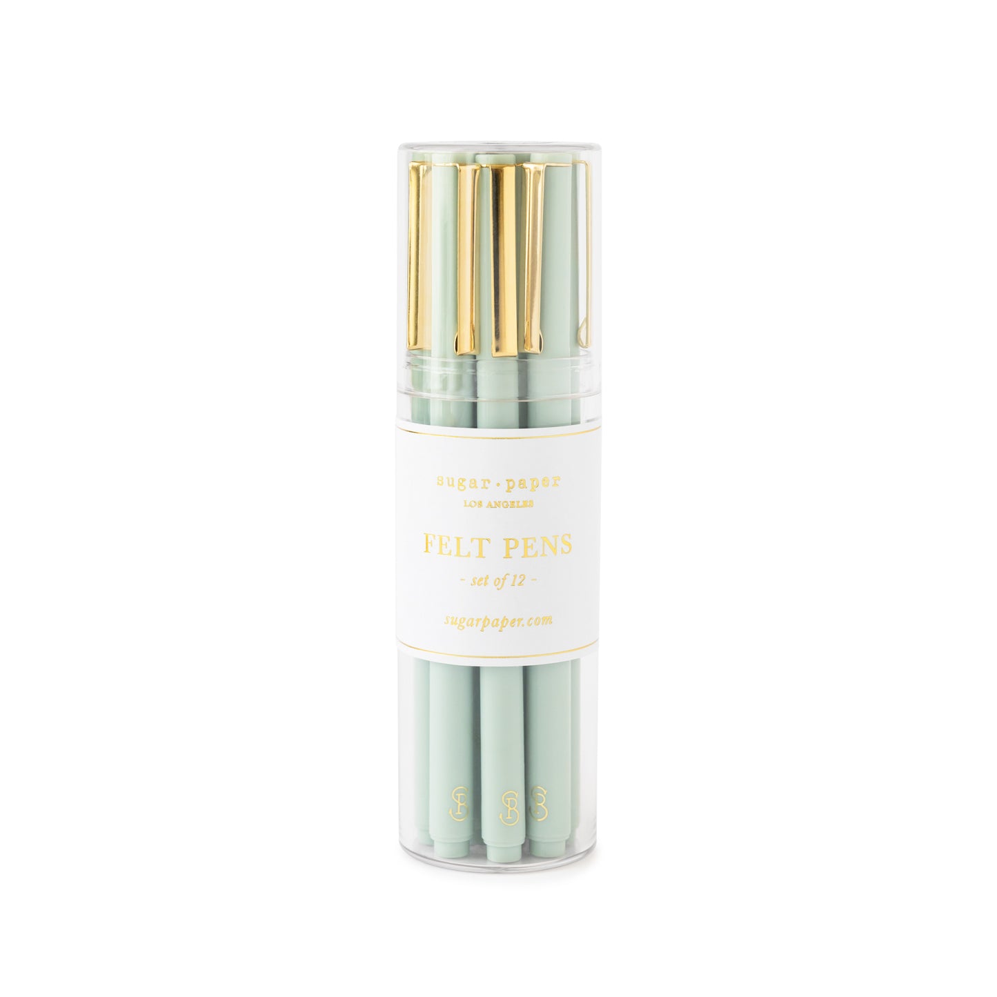Office green felt pens with gold details in a clear acrylic case