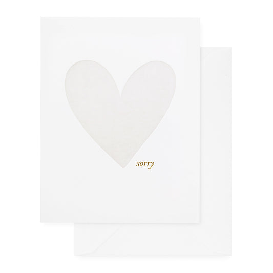 white card with grey heart and gold text, white envelope