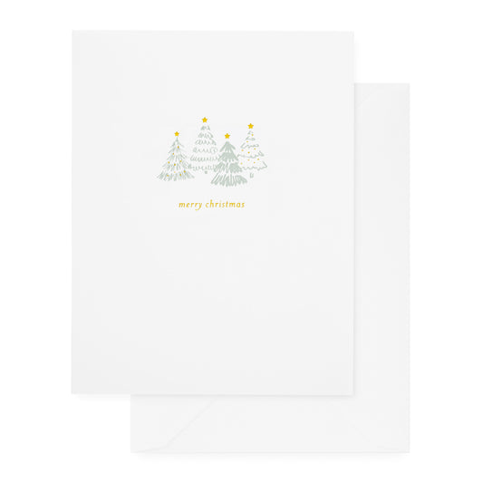 white holiday card with green christmas trees and gold foil details