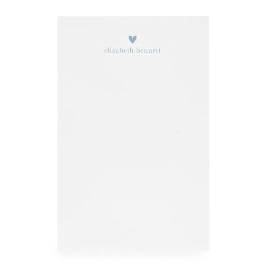 White notepad with heart and "elizabeth bennett" in blue