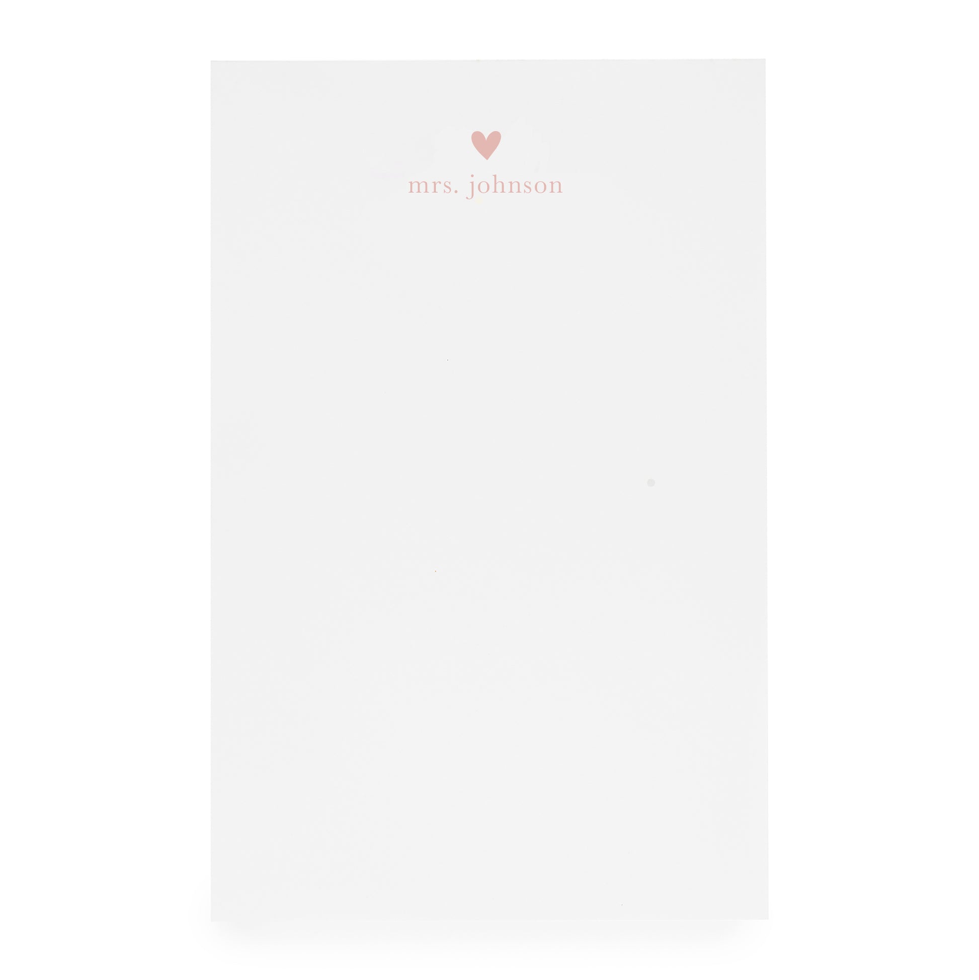 White notepad with heart and "mrs. johnson" printed in pink