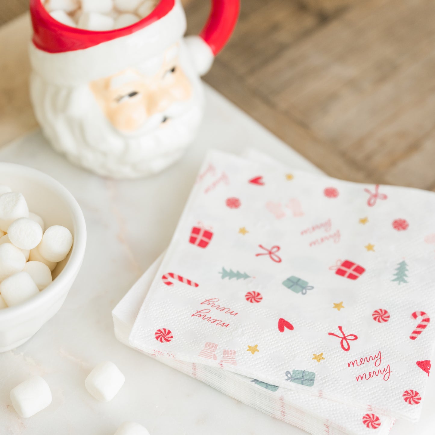 Holiday festive cocktail napkins with santa mug