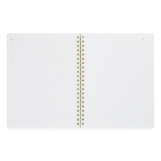 Interior spread of spiral notebook with lined pages and dates