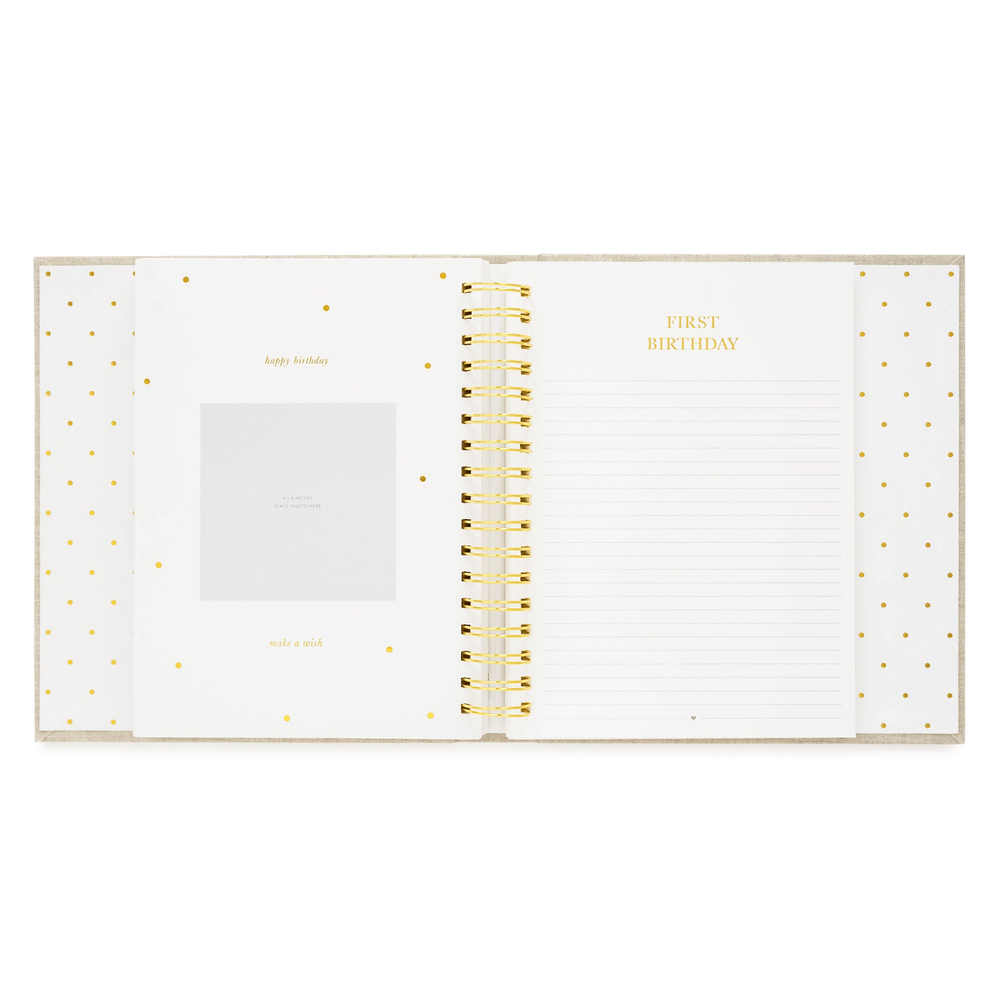 baby book open to first birthday pages