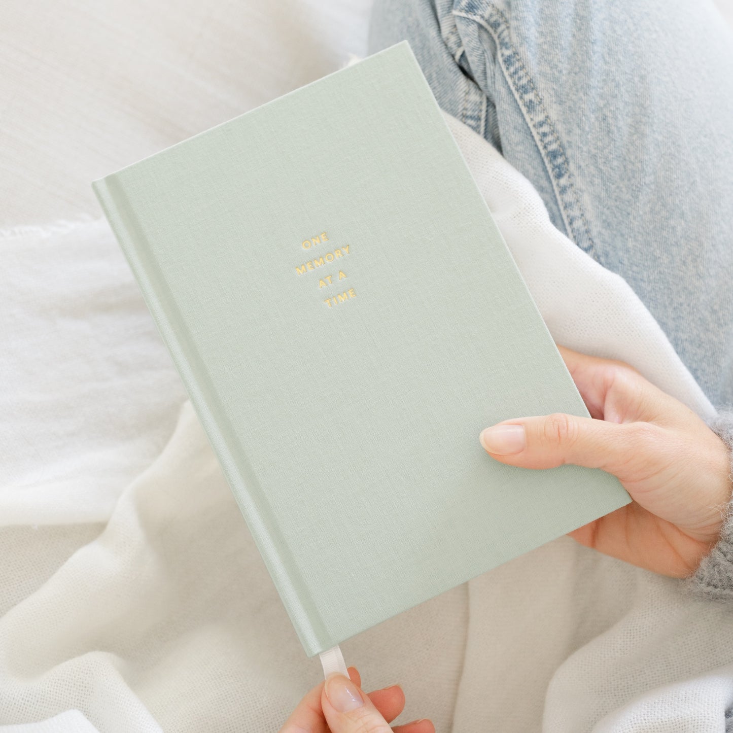 skylight green one memory at a time fabric journal in hand