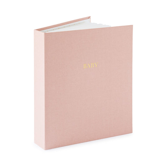 rose fabric baby book book open standing up foil stamped with baby in gold on the cover