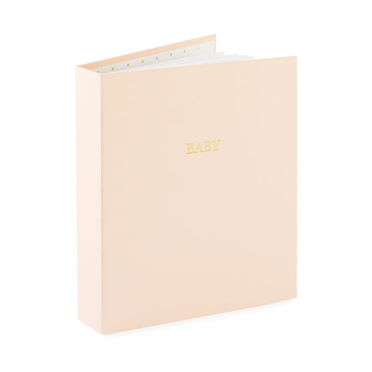 pink fabric baby book book open standing up foil stamped with baby in gold on the cover