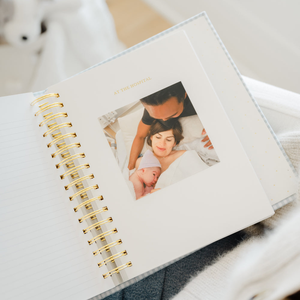baby book open to hospital photo page