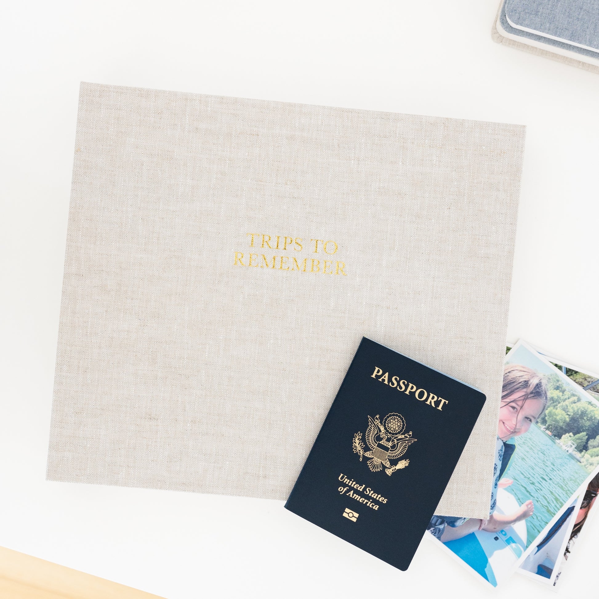 flax trips to remember book with passport on desk