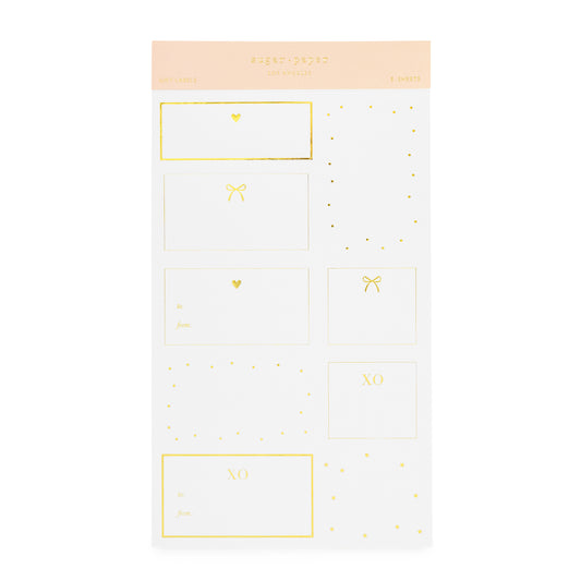 white and gold gift stickers with hearts, dots and bows and prompts for to and from