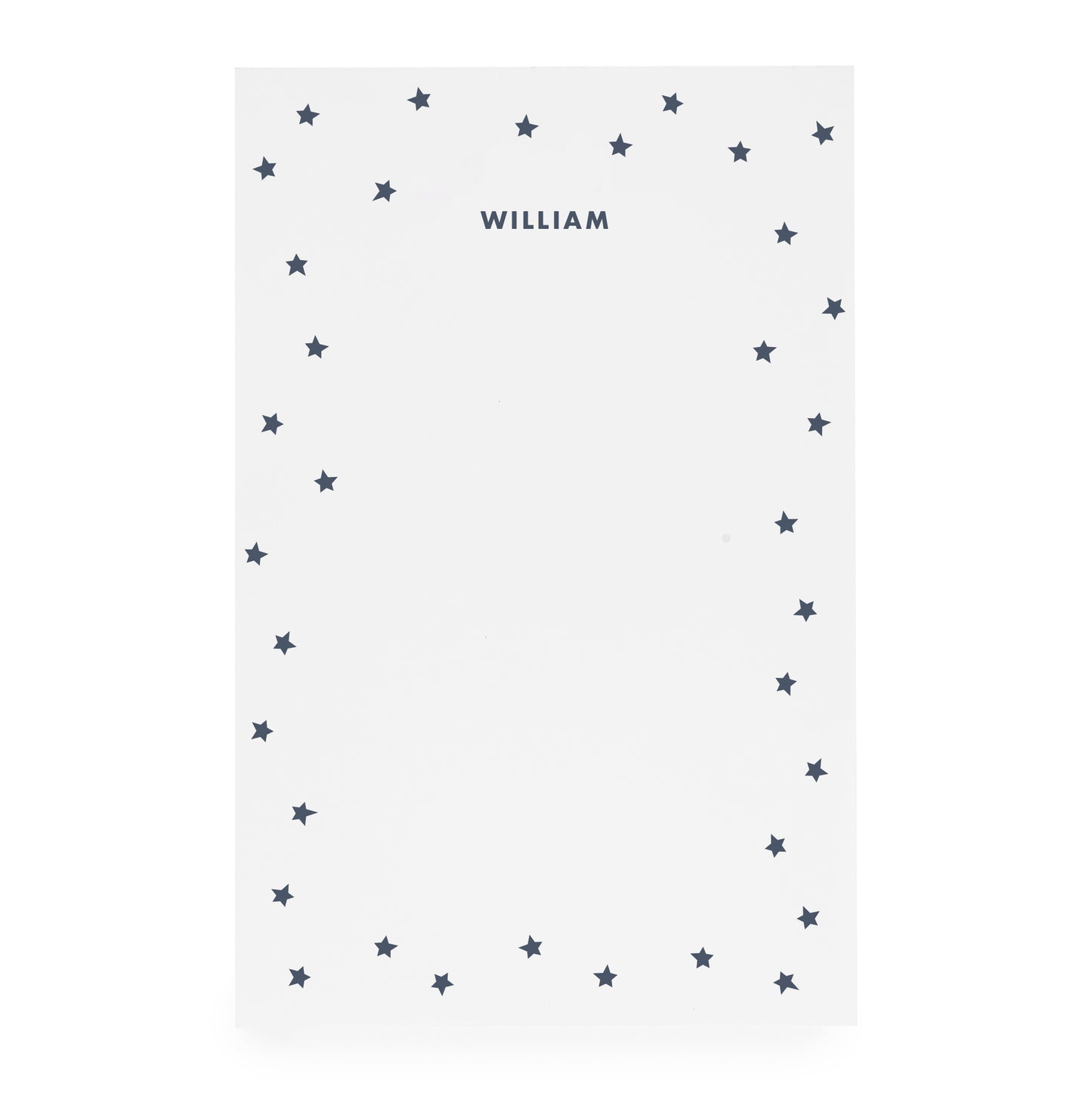 White notepad with scattered star border and 'william' in navy ink