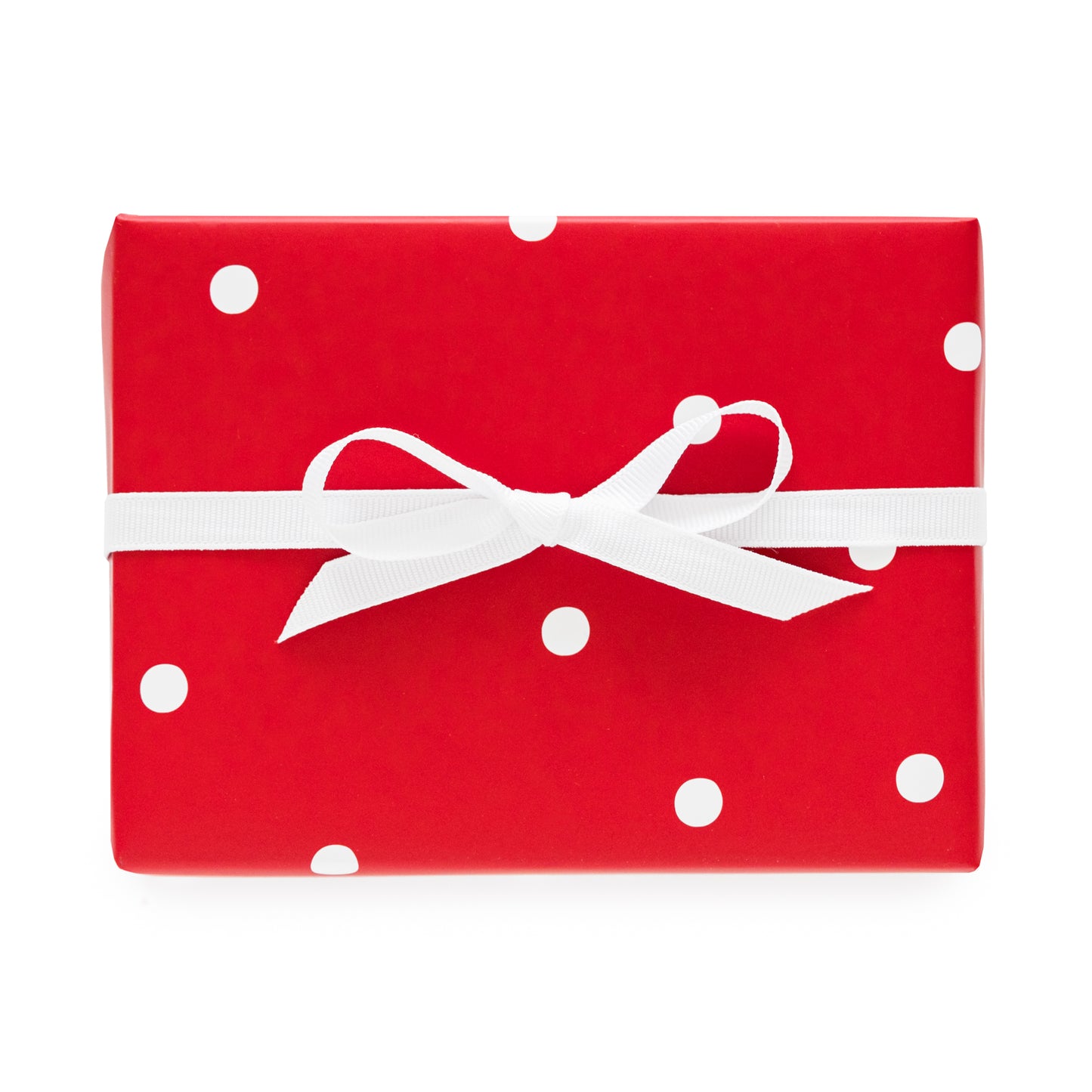 red and white dot gift wrap with white bow