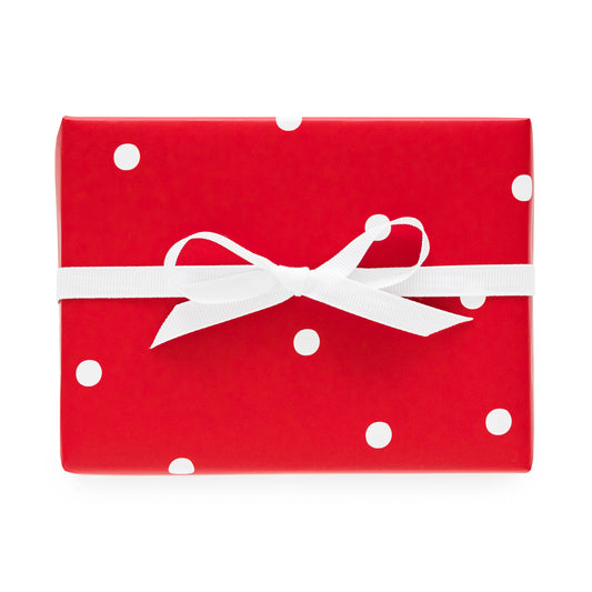 red and white dot gift wrap with white bow