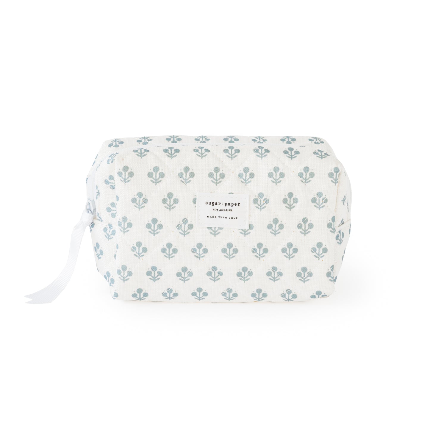 White and blue floral cosmetic pouch with white ribbon pull and zipper