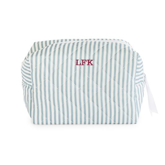 Blue and white striped pouch with white zipper and white ribbon pull embroidered with "LFK" in red thread