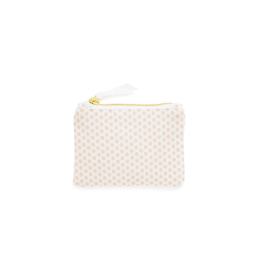 Small white pouch with pink dot pattern and gold zipper