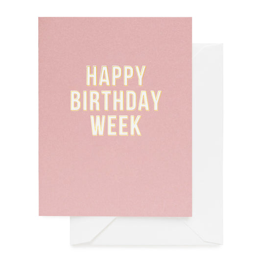 Dusty rose card foil printed in white and gold with Happy Birthday Week