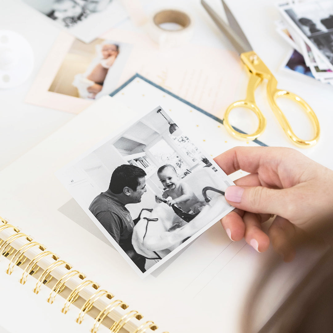 Interior of baby book with photos