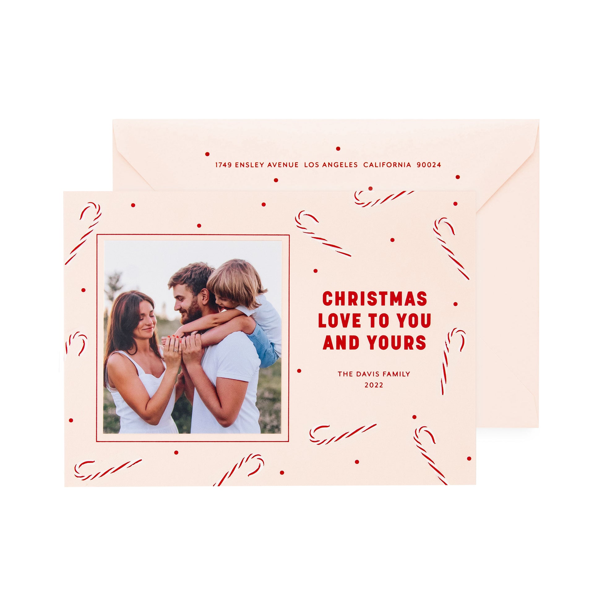 pale pink card with photo, red and white candy canes and red text, pale pink envelope with red text