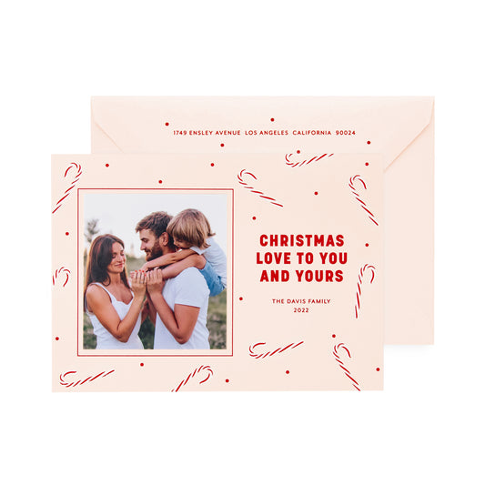 pale pink card with photo, red and white candy canes and red text, pale pink envelope with red text