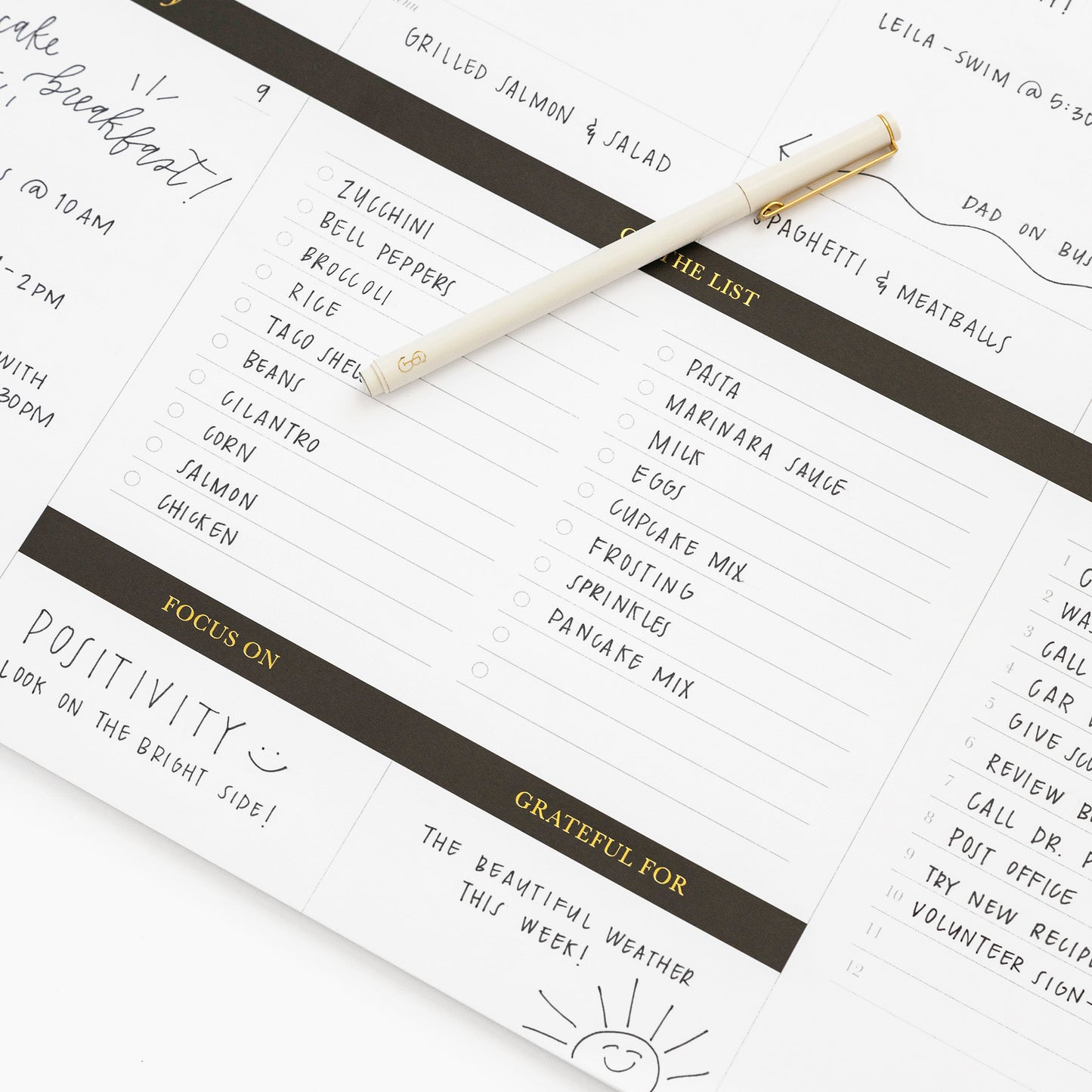 close up of our weekly plan pad with white felt pen